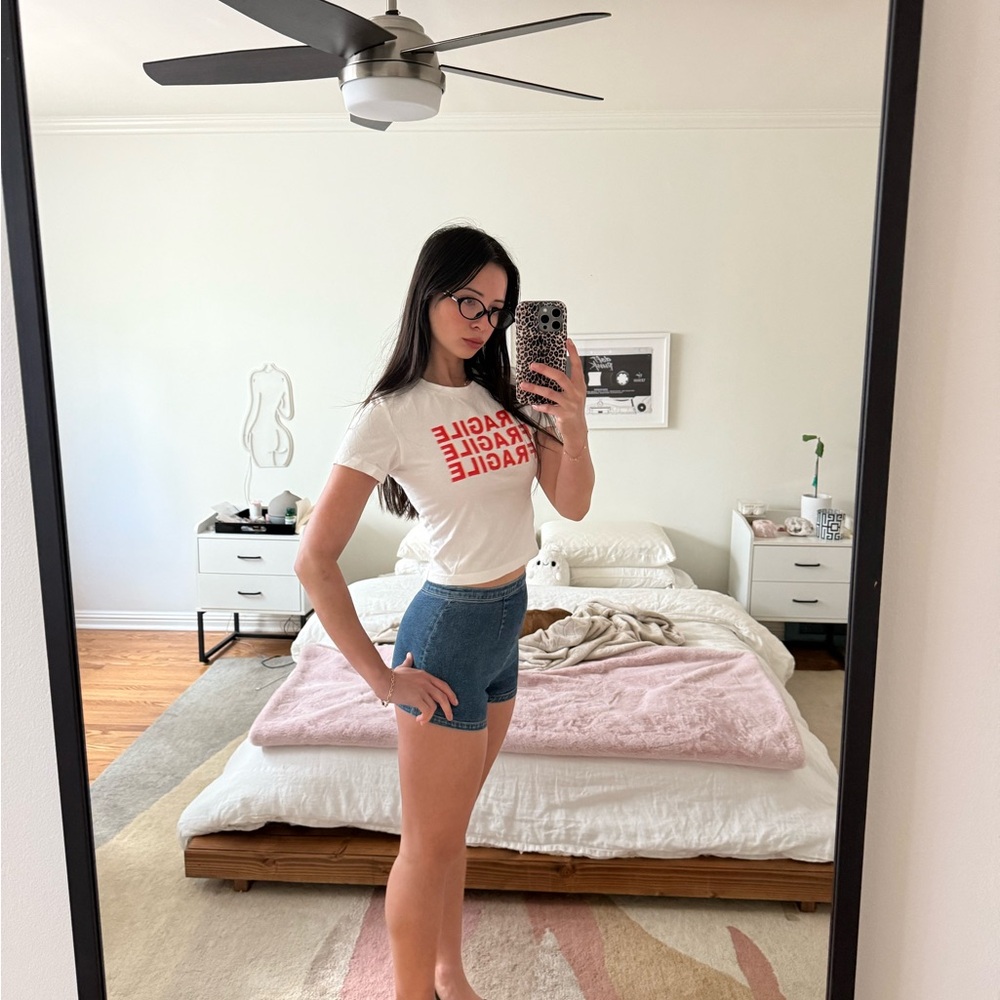 White Graphic Tee and Blue Denim Shorts
